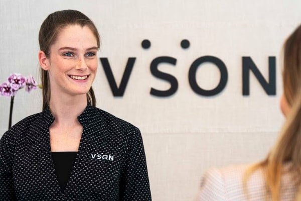 Smiling receptionist at the clinic, Laser Eye Surgery Fortitude Valley