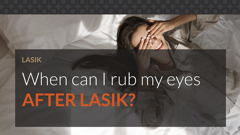 Beautiful woman lying down on the bed, covering her eye with her hands