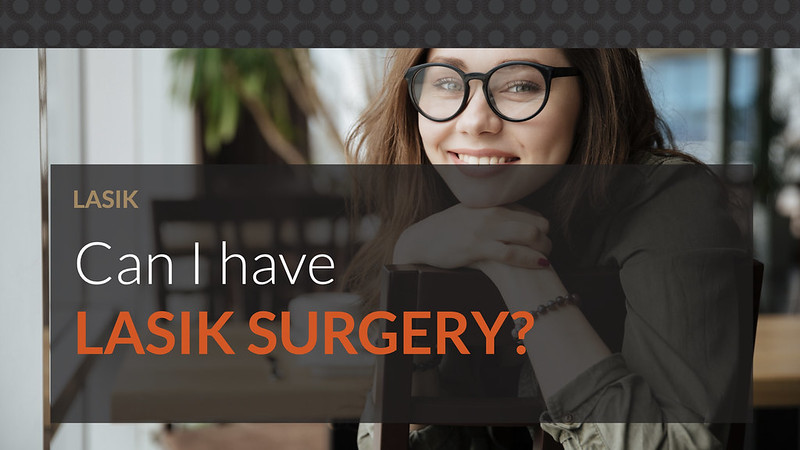 A young, beautiful woman with glasses thinking about getting LASIK surgery.