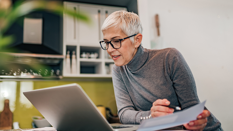 Middle-aged woman with glasses, investigating if she can have lens replacement if she previously had laser eye surgery
